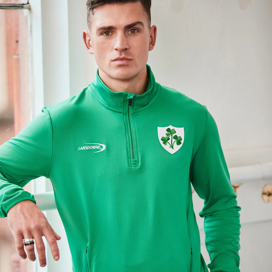 Lansdowne Men's Shamrock Crest 1/4 Zip Green Performance Top - Image 4